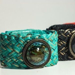 Leather banded, braided bracelet with blown glass